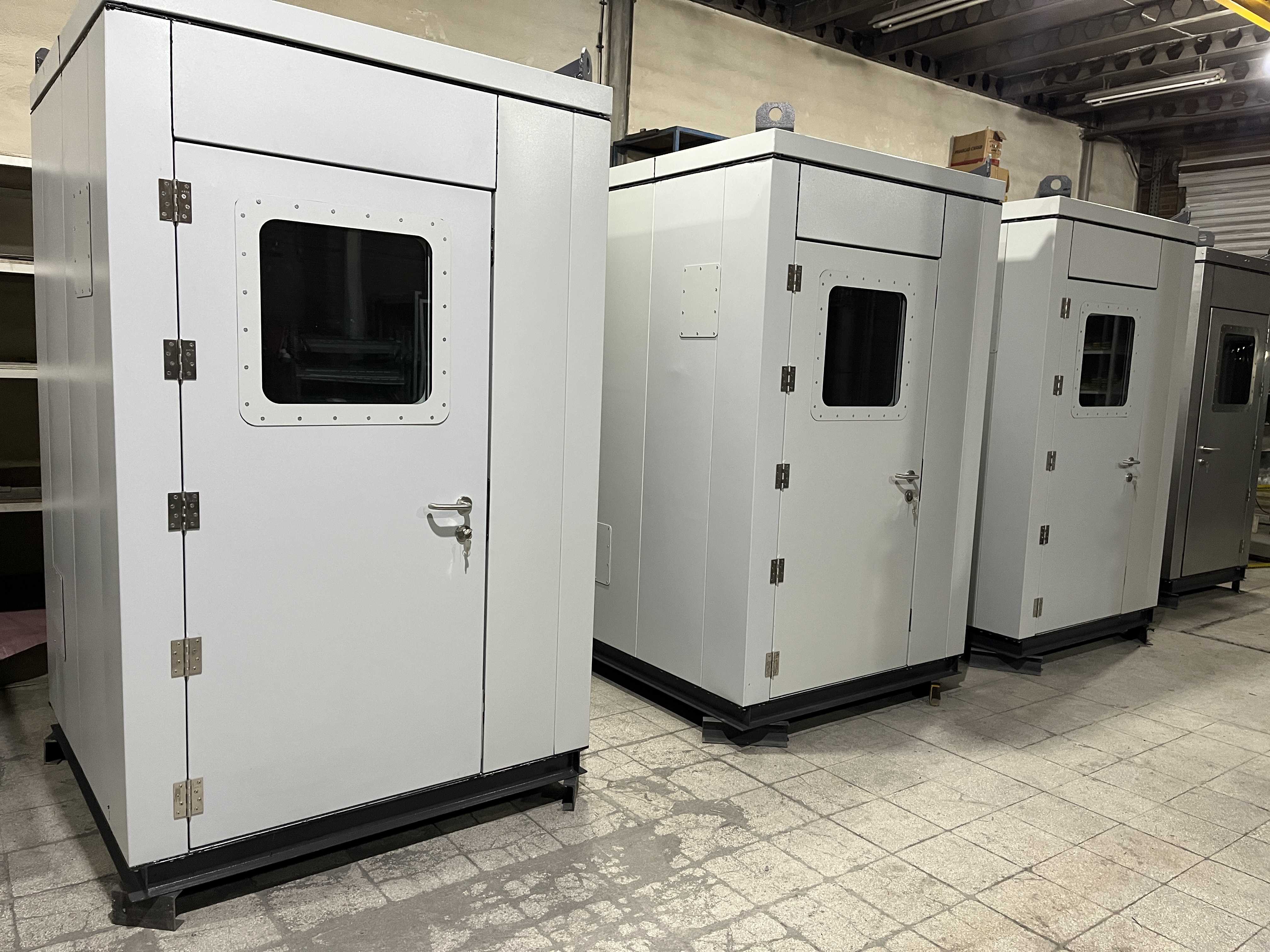 Industrial cabinet equipment used as a visual reference for analyzer cabinet engineering